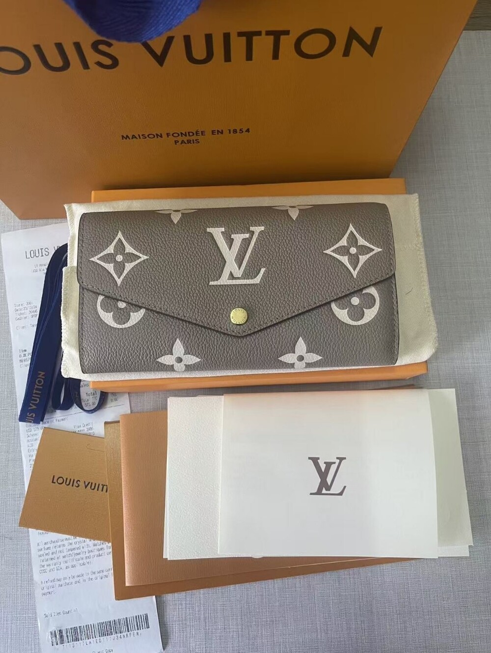 Louis Vuitton Empreinte Sarah Wallet in Tourterelle/Cream